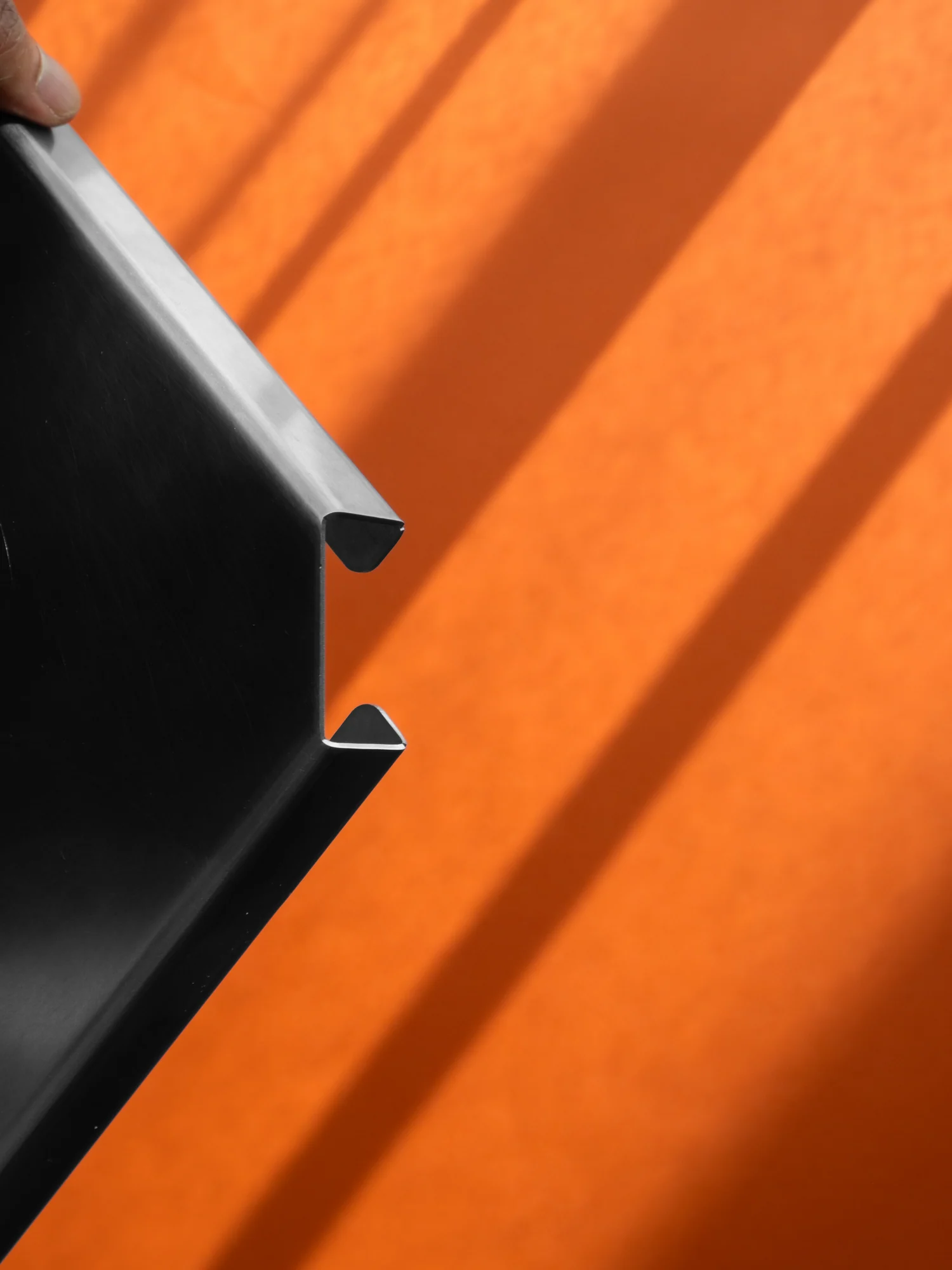 The folded orange-lit edge of Relic 01