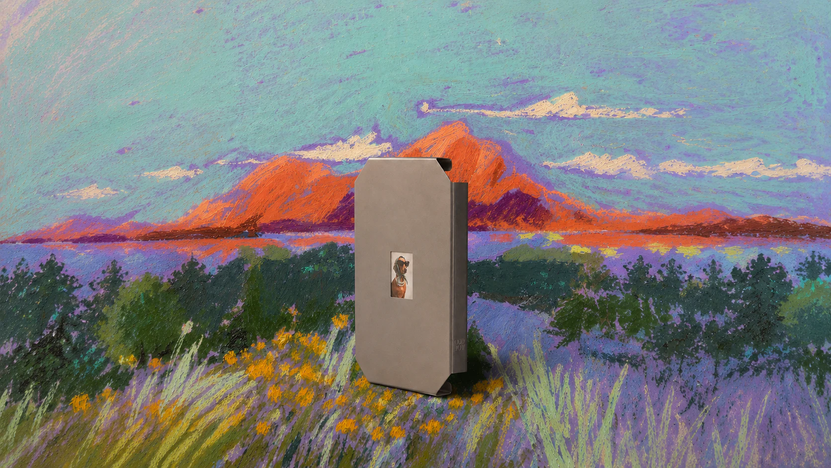 The Oddjoy Memory Frame in a painted mountain landscape